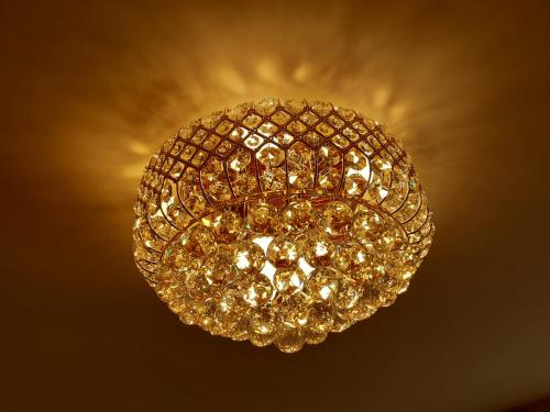 
a lamp that is lit up in a room at Boutique Hotel Frada in Utrecht
