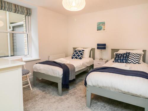 Ένα ή περισσότερα κρεβάτια σε δωμάτιο στο 1 Arlington Villas