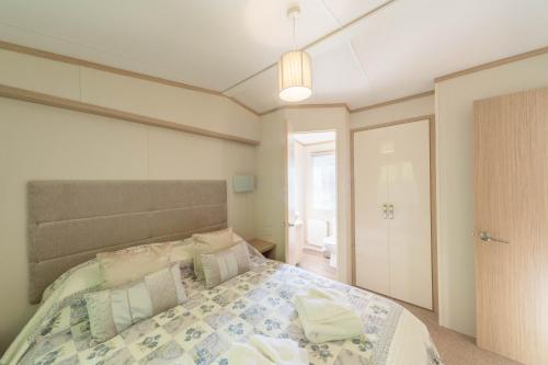 Ένα ή περισσότερα κρεβάτια σε δωμάτιο στο Willow Lodge