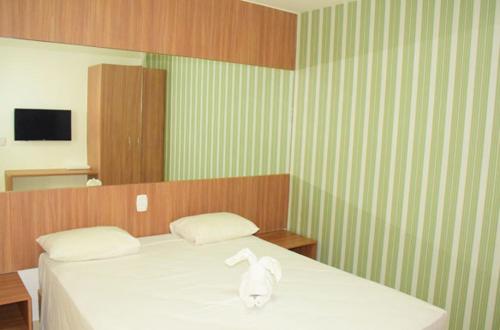 Cama o camas de una habitación en Resort Encontro das Águas