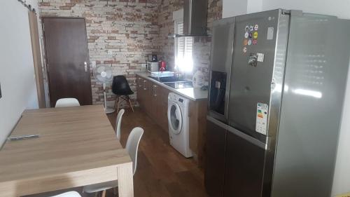 Kuchyňa alebo kuchynka v ubytovaní apartamento el molino con piscina privada