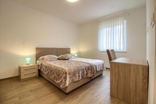 Posteľ alebo postele v izbe v ubytovaní Charming villa Aurora with private pool 200m from the beach for up to 10 persons - WiiBuk