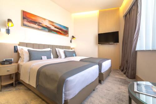 Postel nebo postele na pokoji v ubytování Crowne Plaza Cappadocia - Nevsehir by IHG