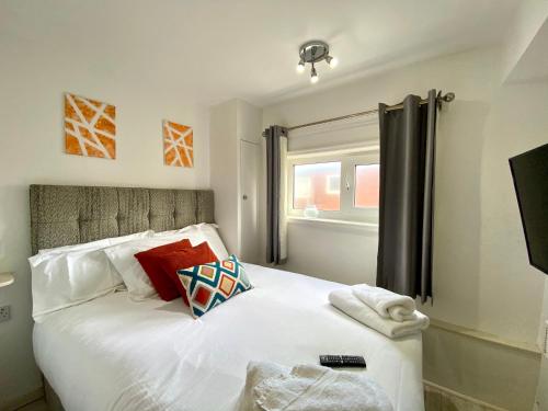 Ένα ή περισσότερα κρεβάτια σε δωμάτιο στο Kennedy House by Blackpool Service Apartments