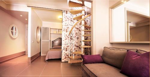 Posteľ alebo postele v izbe v ubytovaní Cala del Porto Residence