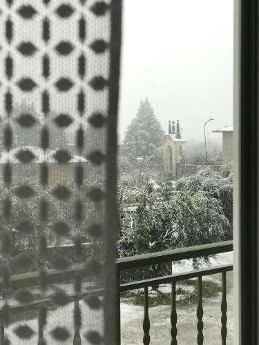 a view from a window with a view of a yard at Corte Viviani in Brescia