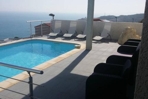 Bazén v ubytování villa standing vue mer 180° clim.pisc. nebo v jeho okolí