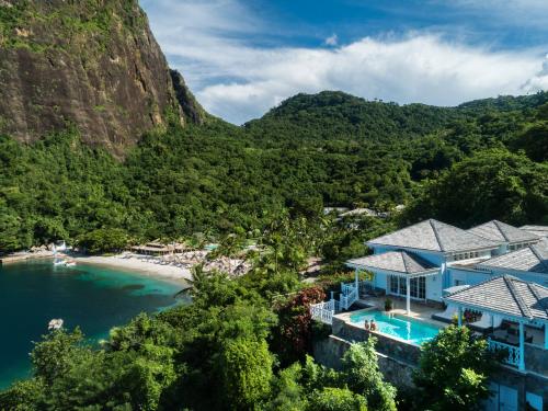 an aerial view of the resort and the beach at Sugar Beach, A Viceroy Resort in Soufrière