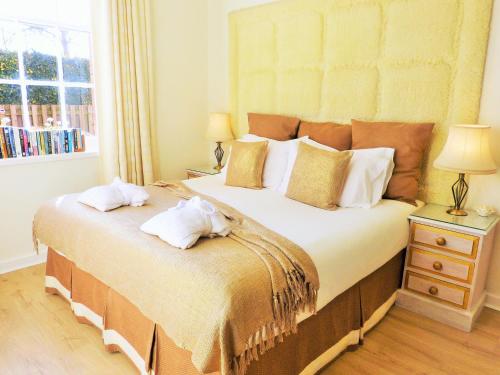 Cama o camas de una habitación en County House Retreat