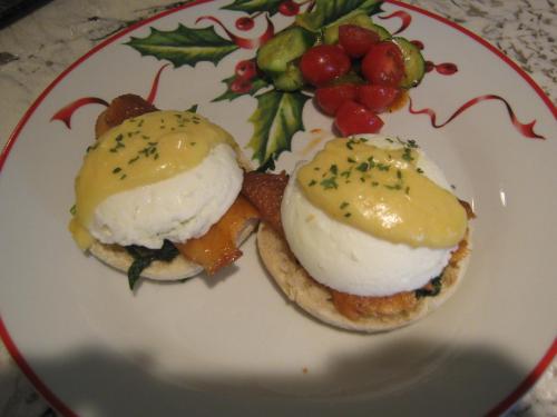 a plate of food with two eggs and fruit at Wakamow Heights Bed and Breakfast in Moose Jaw