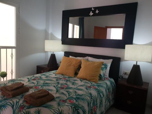Postel nebo postele na pokoji v ubytování Las Galletas 2 B sol, playa, relax