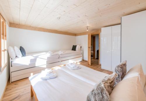 Postel nebo postele na pokoji v ubytování Chalet Ledibach