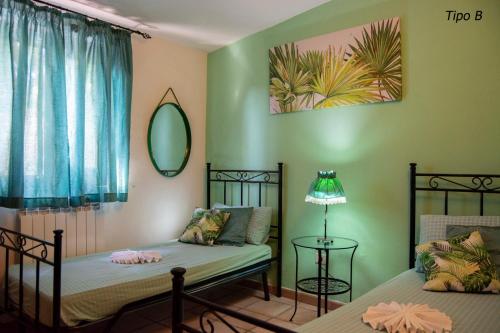 A bed or beds in a room at Casa Vacanze Villa Francy