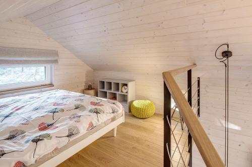 Postel nebo postele na pokoji v ubytování Tiny Vacation