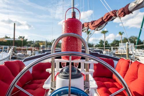 a red buoy on a boat with red seats at Romantic Escape in Downtown St Augustine in Saint Augustine