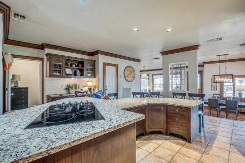 a kitchen with a sink and a counter top at Beautiful Hill Country Ranch Home - 4 Mi to Town! in Boerne
