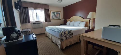 Säng eller sängar i ett rum på Travelodge by Wyndham Kanab