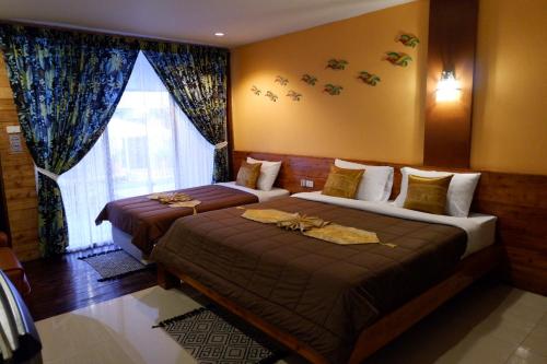 Cama o camas de una habitación en The Park Ayutthaya Resort And Spa