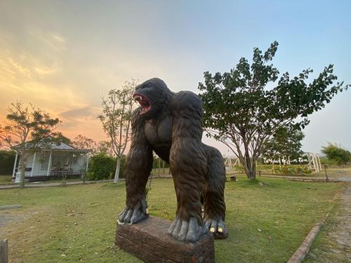 a statue of a bear with its mouth open at Terrua Main Ten Villa Garden in Suan Phung