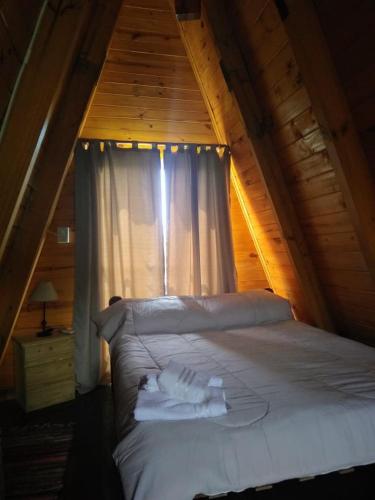 Llit o llits en una habitació de CHE RAJY