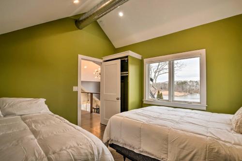 a green bedroom with a bed and a window at 1 Mi to Ferry and Beach Waterfront Hyannis Home! in Hyannis