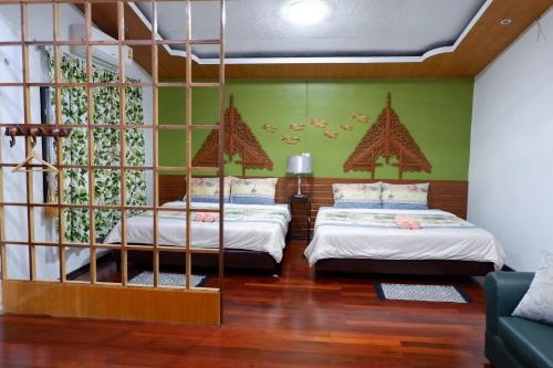 Cama o camas de una habitación en The Park Ayutthaya Resort And Spa