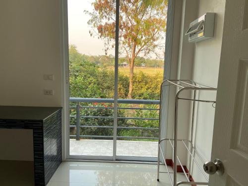 Μπαλκόνι ή βεράντα στο ร่มปาล์มรีสอร์ท สระบุรี Rompalm Saraburi