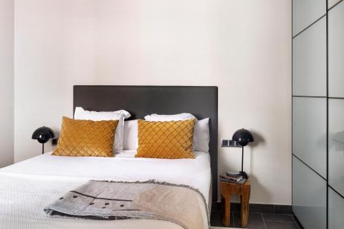Cama o camas de una habitación en C211 Barcelona Apartments