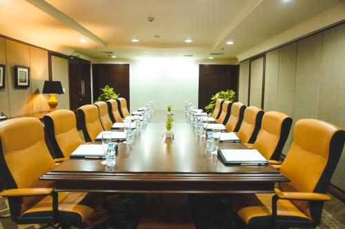 a large conference room with a long table and chairs at Swiss-Belhotel Serpong in Serpong