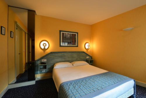 Кровать или кровати в номере Relais du Pré