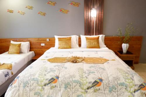 Cama o camas de una habitación en The Park Ayutthaya Resort And Spa