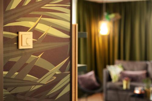 Coin salon dans l'établissement Holiday Inn - the niu, Crusoe Bremen Airport by IHG