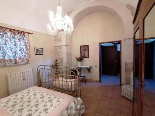 Una cama o camas en una habitación de Agriturismo Baglio Calanchi