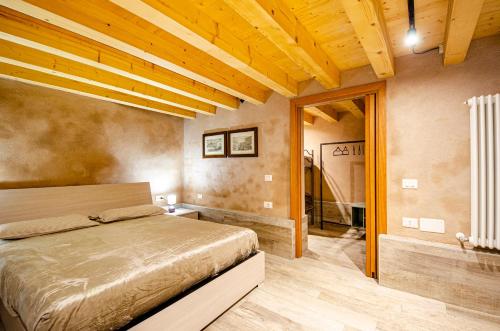 Llit o llits en una habitació de Ca' Nane