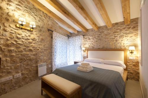 Can Clotas Hotel Masiaにあるベッド