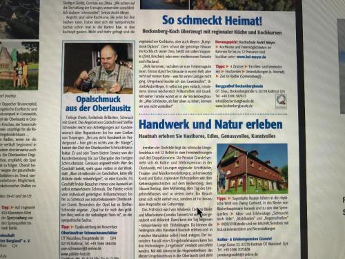 a newspaper article with a picture of a house at Pension Grandel in Kottmar