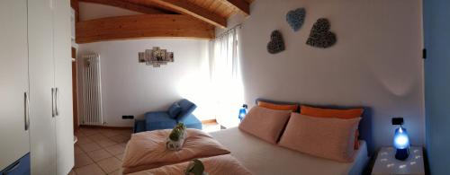 A bed or beds in a room at ECO - Villetta Arcobaleno