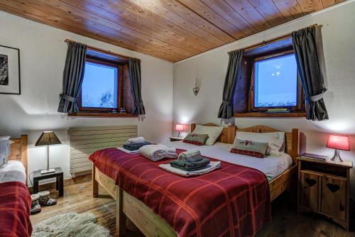 Кровать или кровати в номере Chalet Tissières