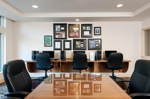 a conference room with a table and chairs at The Mediterranean Inn in Seattle
