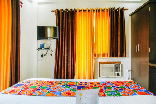 FabHotel Eleanora - New Townにあるベッド