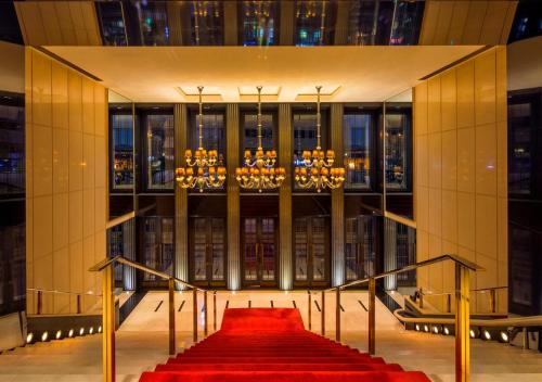 a red staircase in front of a building at Key Hotel in Izmir