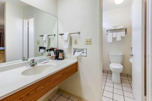 a bathroom with a sink and a toilet at Econo Lodge On Historic Route 66 in Barstow
