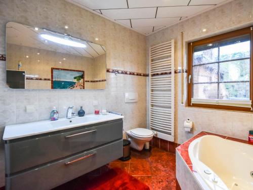 Ένα μπάνιο στο Ferienhaus Jasmund