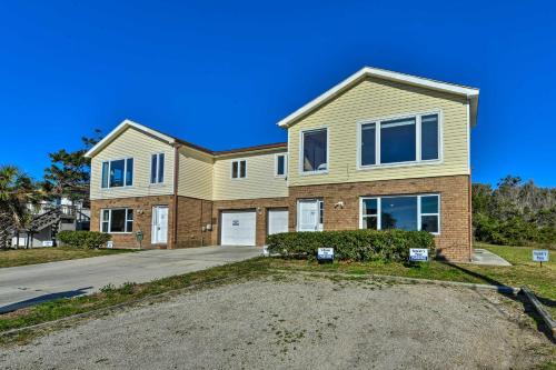 a large house with a driveway at Hannahs Place - Quaint and Cozy Apt by the Beach! in Emerald Isle
