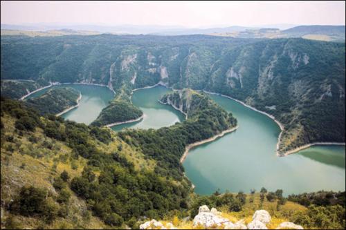 an aerial view of two lakes on a mountain at Apartman Jela in Nova Varoš