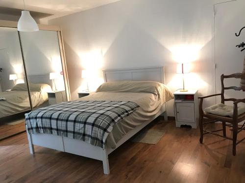 Säng eller sängar i ett rum på Un Gite en Provence
