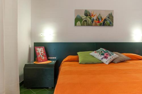 En eller flere senge i et værelse på Casa Vacanza Kair Trilo 225