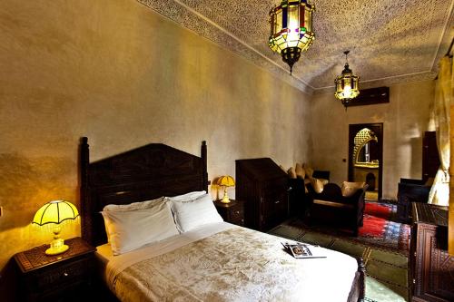 Cama o camas de una habitación en Riad Tidar by Phoenix