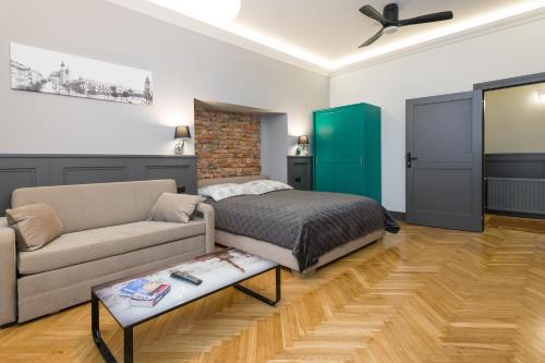 Ένα ή περισσότερα κρεβάτια σε δωμάτιο στο LUXURY Apartment at the Main Square Tomasza street
