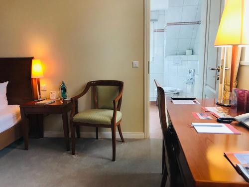 Ein Bett oder Betten in einem Zimmer der Unterkunft Höger's Hotel & Restaurant